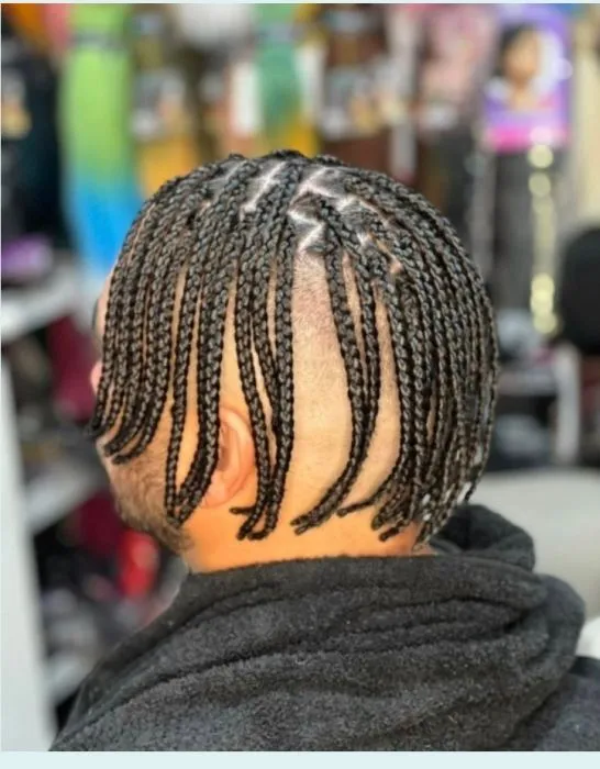 Men undercut box braids neck length — salon work by Mariama