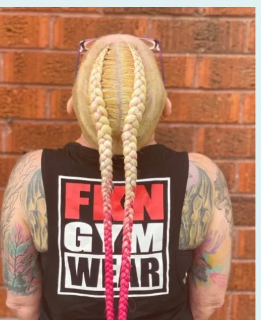 Adult Two top braids — salon work by Mariama
