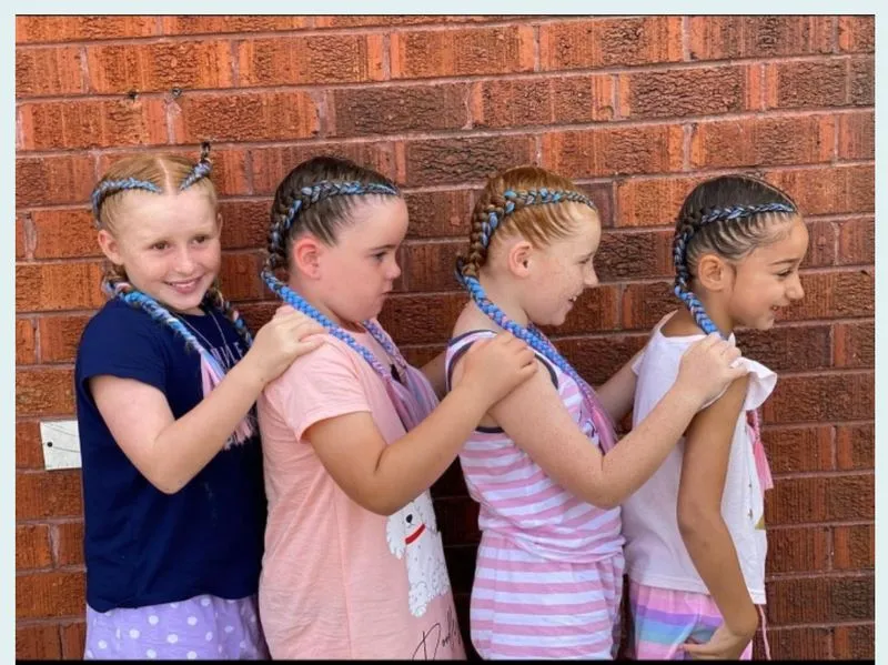 5 kids, 2 Dutch braids each — salon work by Mariama