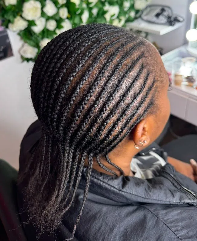 Natural cornrows — salon work by Mariama